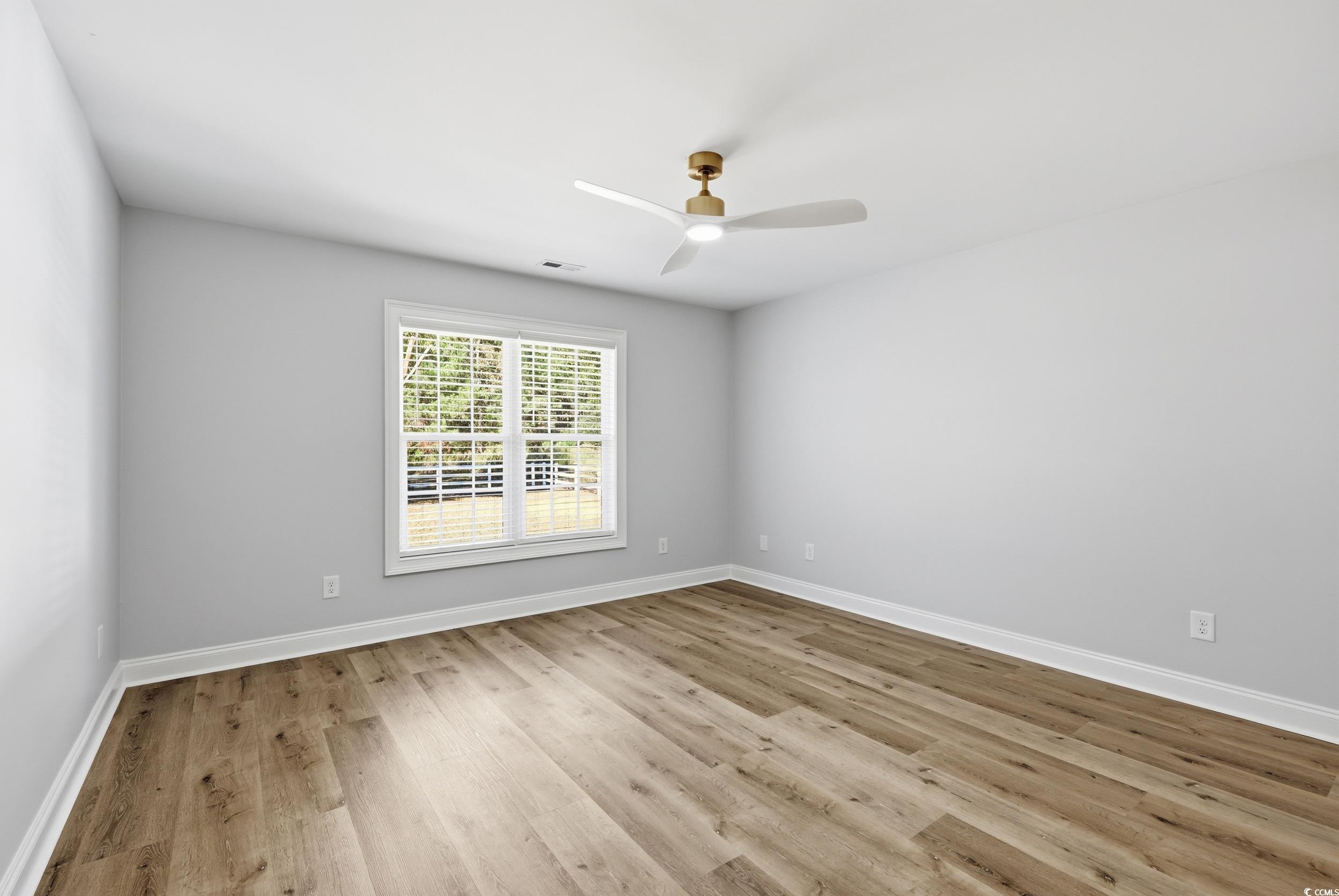4337 State Highway 65 Conway, SC 29526 - Photo 14 of 39 Unfurnished room with light wood finished floors and ceiling fan
