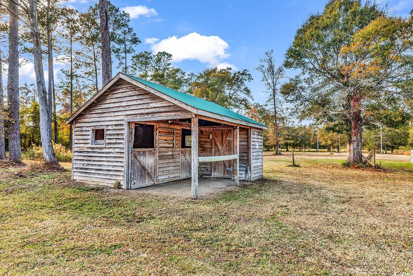 4337 State Highway 65 Conway, SC 29526 - Photo 34 of 39 View of outbuilding featuring view of wooded area