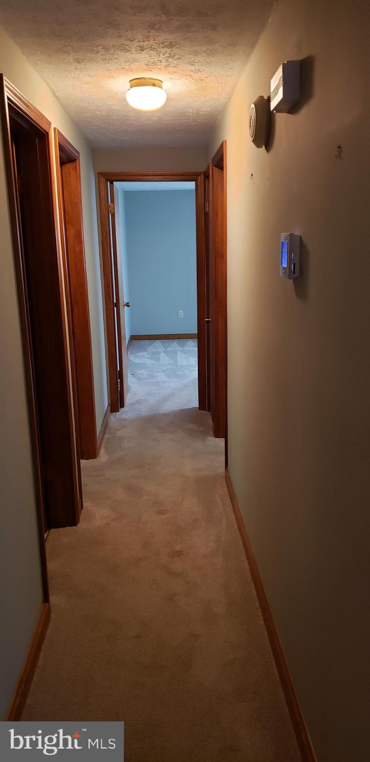 11018 Dahlgren Road King George, VA 22485 - Photo 16 of 32 Hallway to Bedrooms