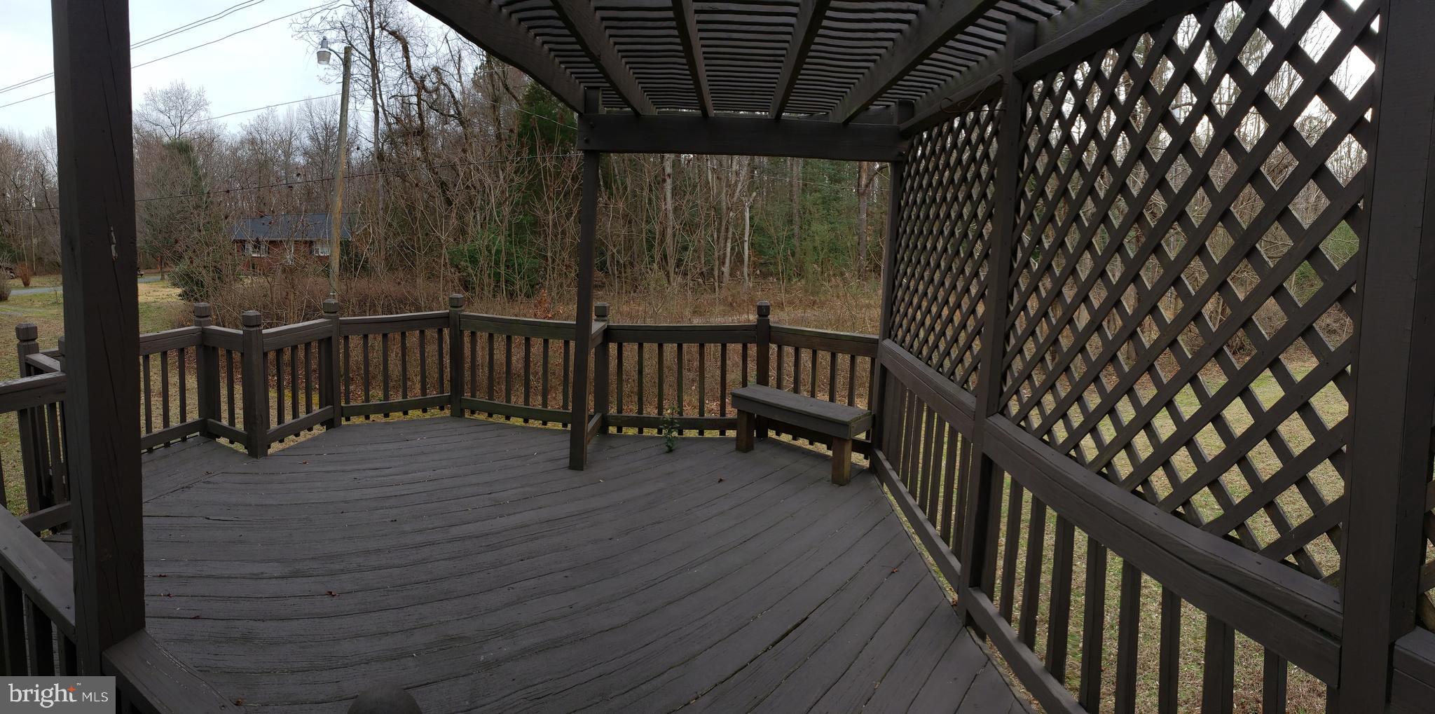 11018 Dahlgren Road King George, VA 22485 - Photo 9 of 32 Rear Deck with Lattice Fence