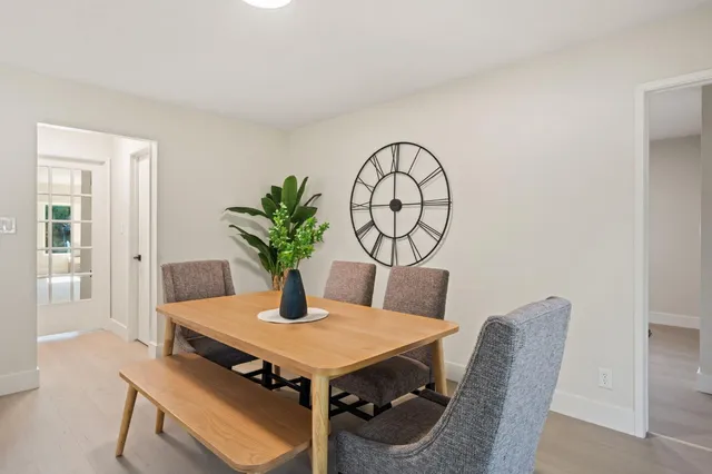 a view of a dining room with furniture