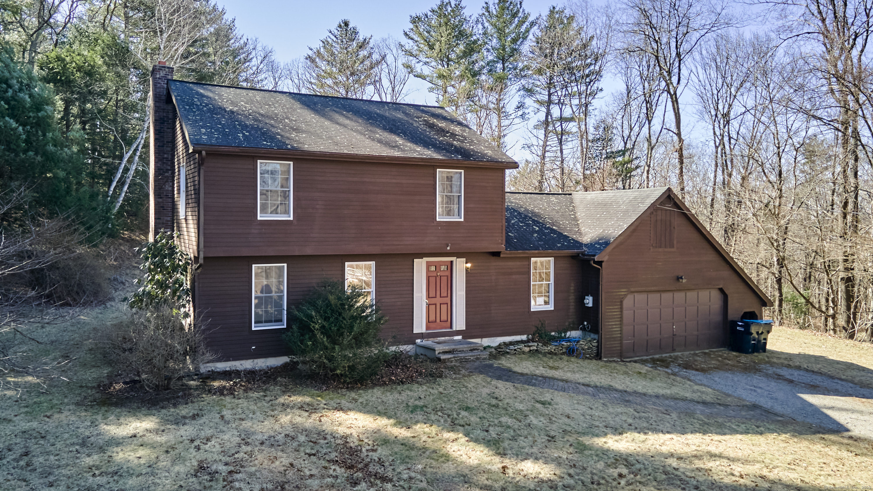 105 Hurry Hill Road Putnam, CT 06260 - Photo 1 of 1 Nestled in a beautifully wooded area, the large yard offers a private and peaceful retreat, perfect for outdoor activities and relaxing