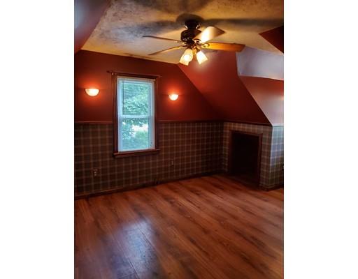 3276 Boston Road Wilbraham, MA 01095 - Photo 8 of 9 a view of an empty room with window and wooden floor