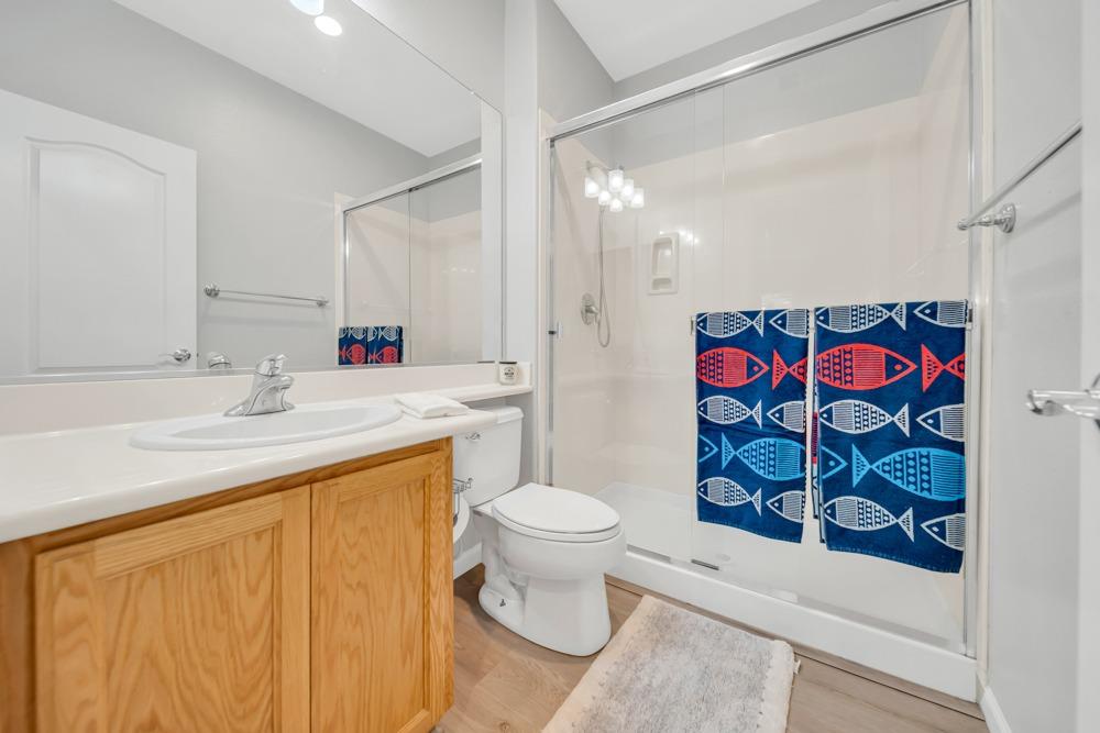 20300 Panoz Road Patterson, CA 95363 - Photo 15 of 60 Full bath downstairs front of the house