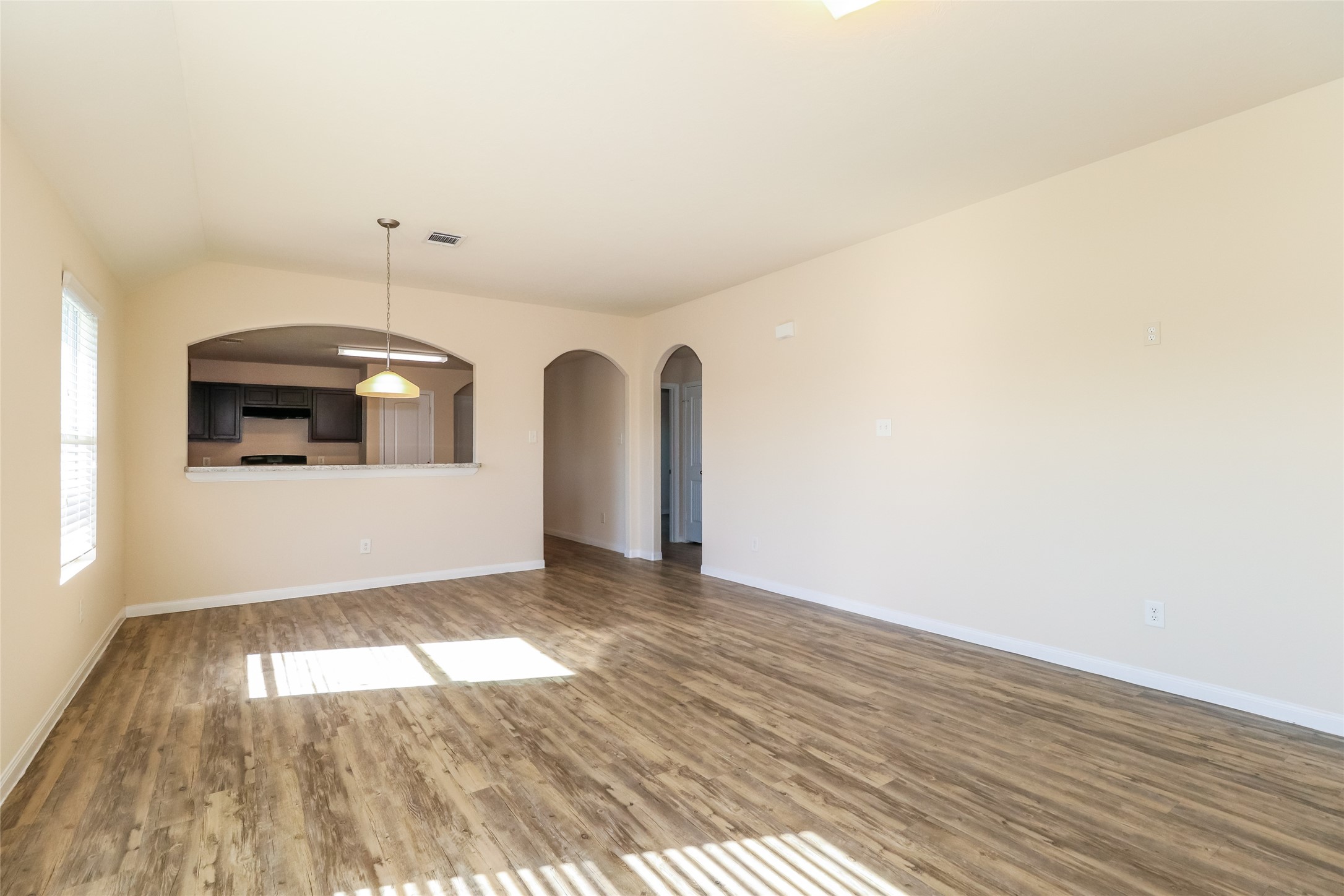 2418 Connors Path Court Houston, TX 77073 - Photo 2 of 14 a view of empty room with wooden floor
