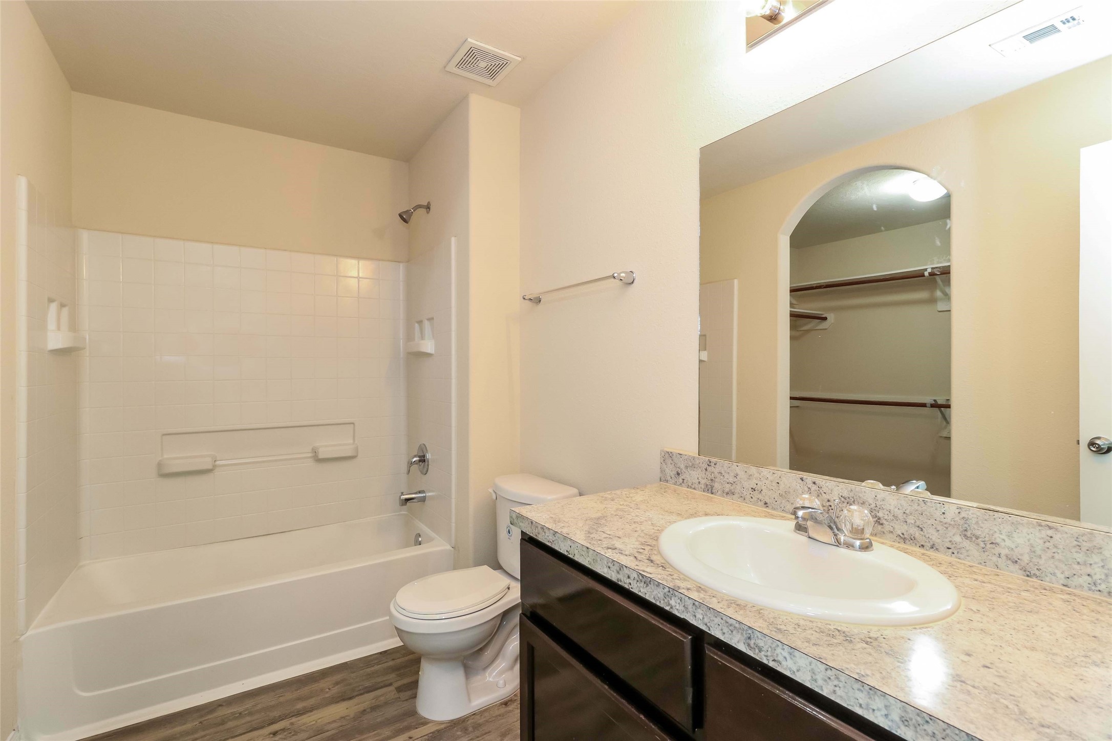 2418 Connors Path Court Houston, TX 77073 - Photo 9 of 14 a bathroom with a granite countertop sink toilet and shower