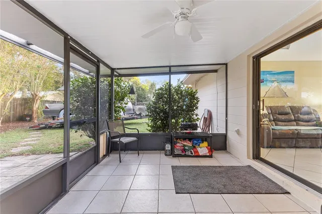 a room with furniture and a large window