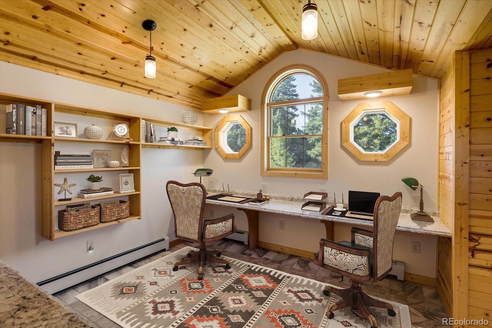 283 Chute Road Golden, CO 80403 - Photo 20 of 40 a workspace with furniture and a clock