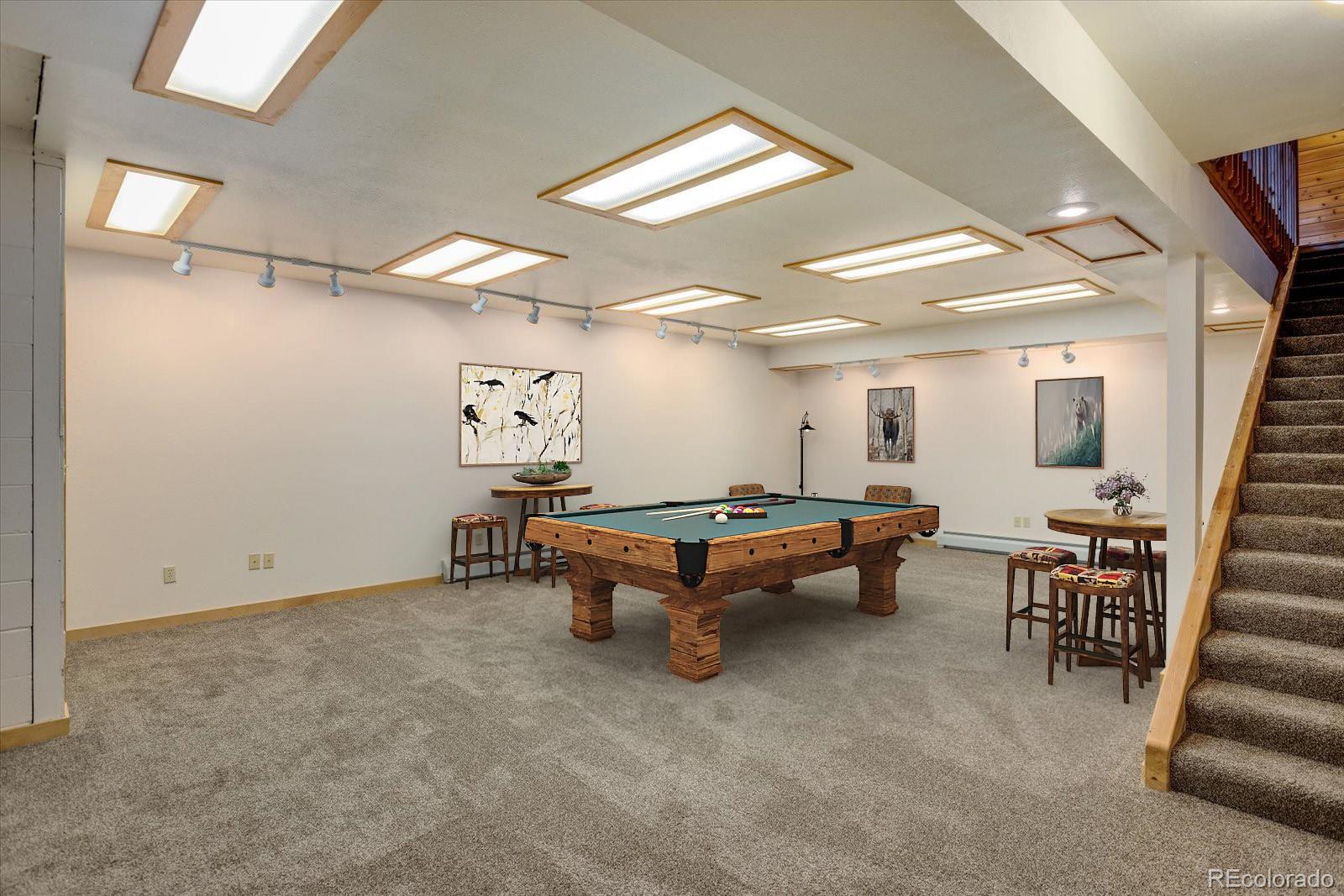 283 Chute Road Golden, CO 80403 - Photo 28 of 40 a room with furniture and air hockey table