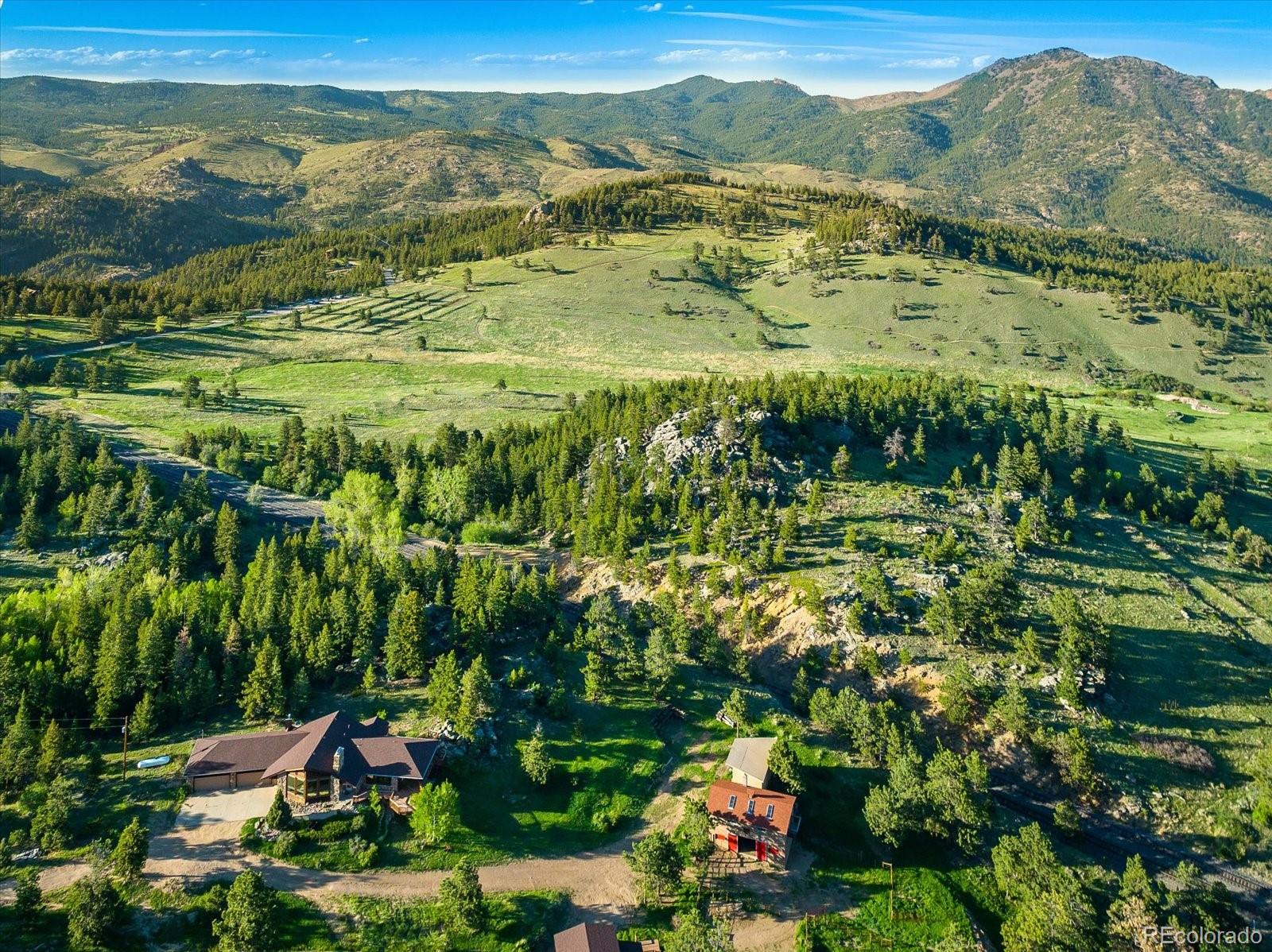 283 Chute Road Golden, CO 80403 - Photo 35 of 40 a view of lake with mountain