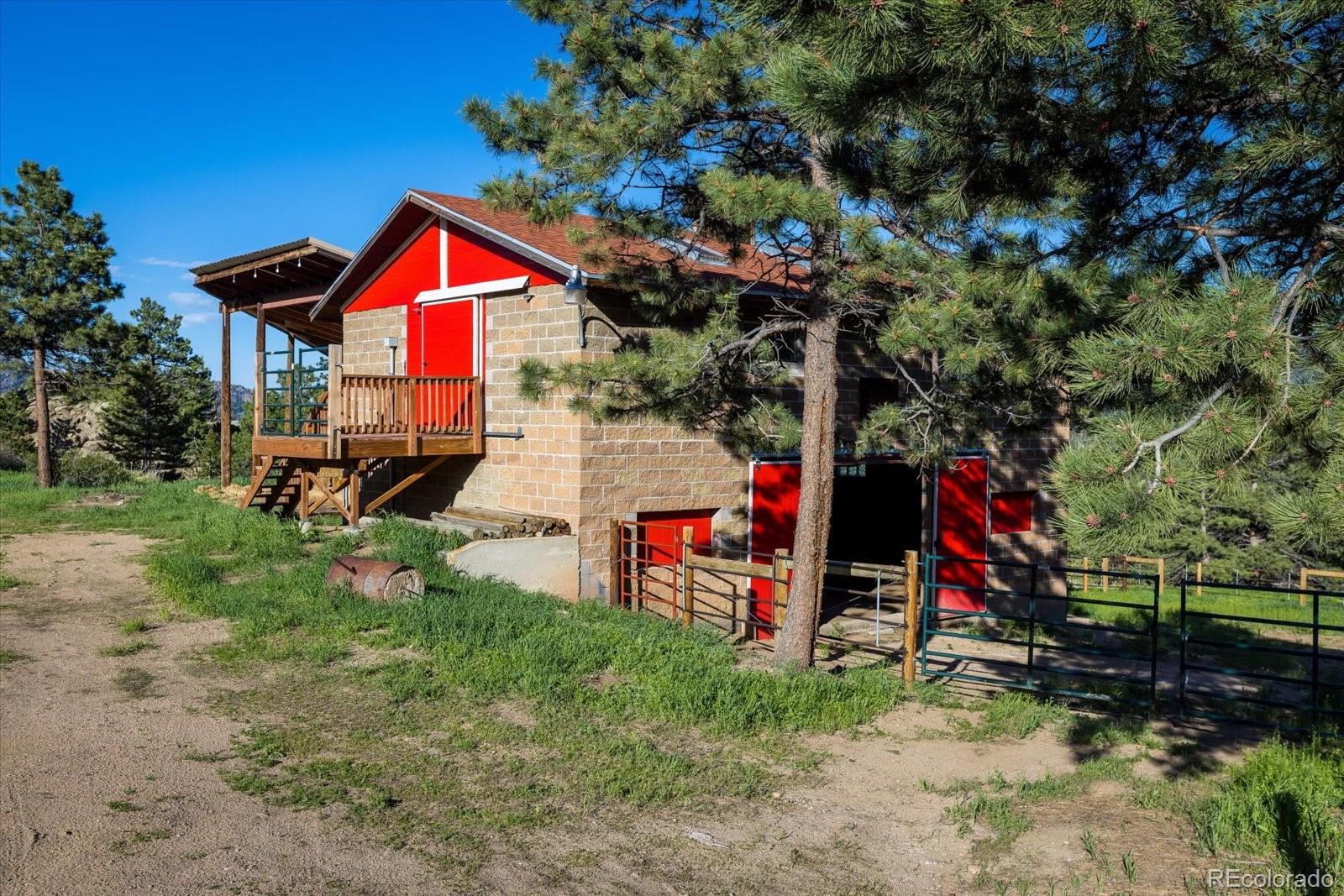 283 Chute Road Golden, CO 80403 - Photo 5 of 40 a flag is sitting in the middle of a yard