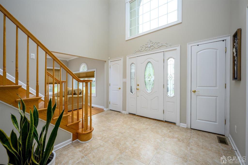 133 Thomas Drive Clark, NJ 07066 - Photo 4 of 30 a view of an entryway with staircase