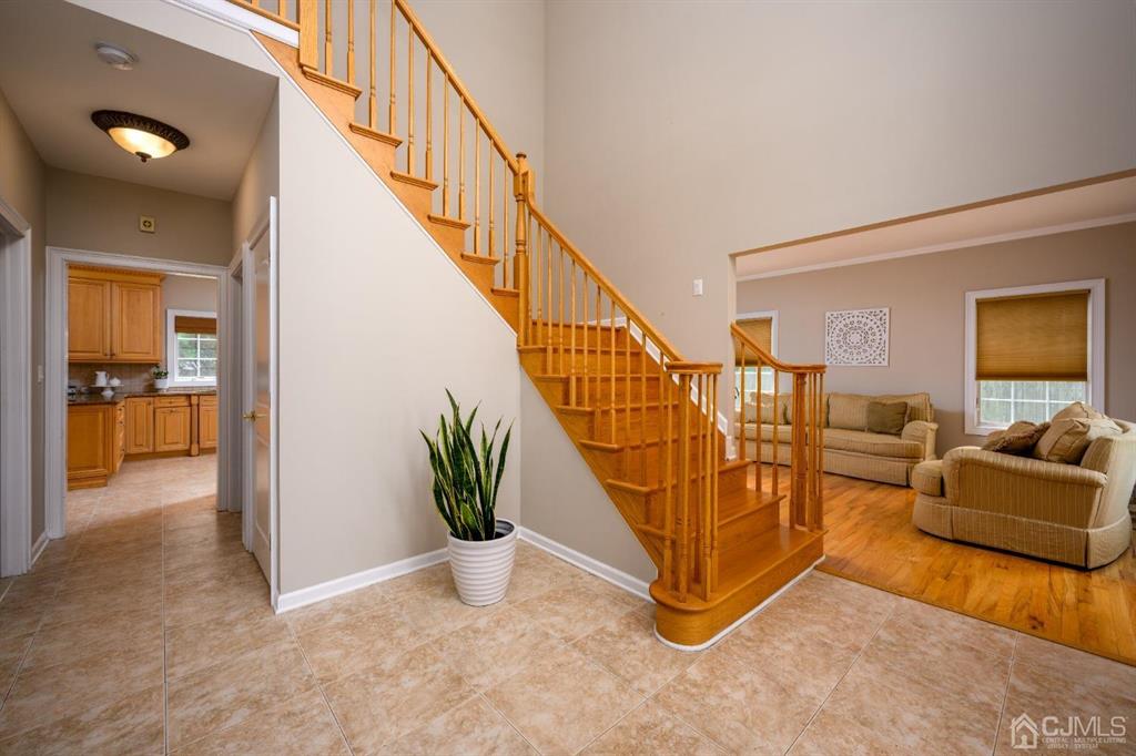 133 Thomas Drive Clark, NJ 07066 - Photo 5 of 30 a view of a livingroom with furniture and a hallway