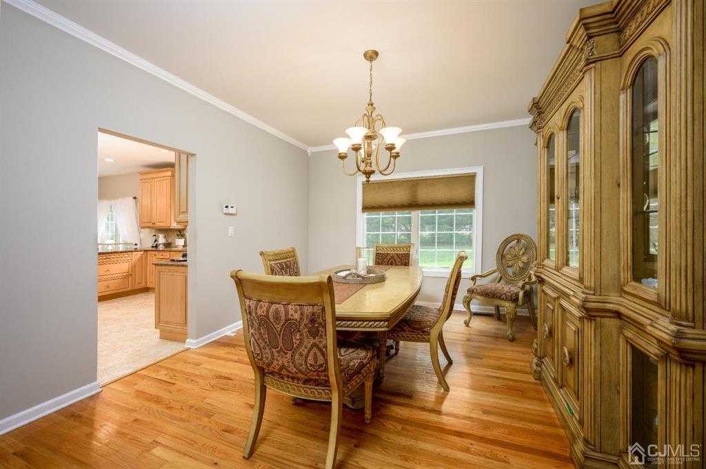 133 Thomas Drive Clark, NJ 07066 - Photo 8 of 30 a dining room with furniture and window