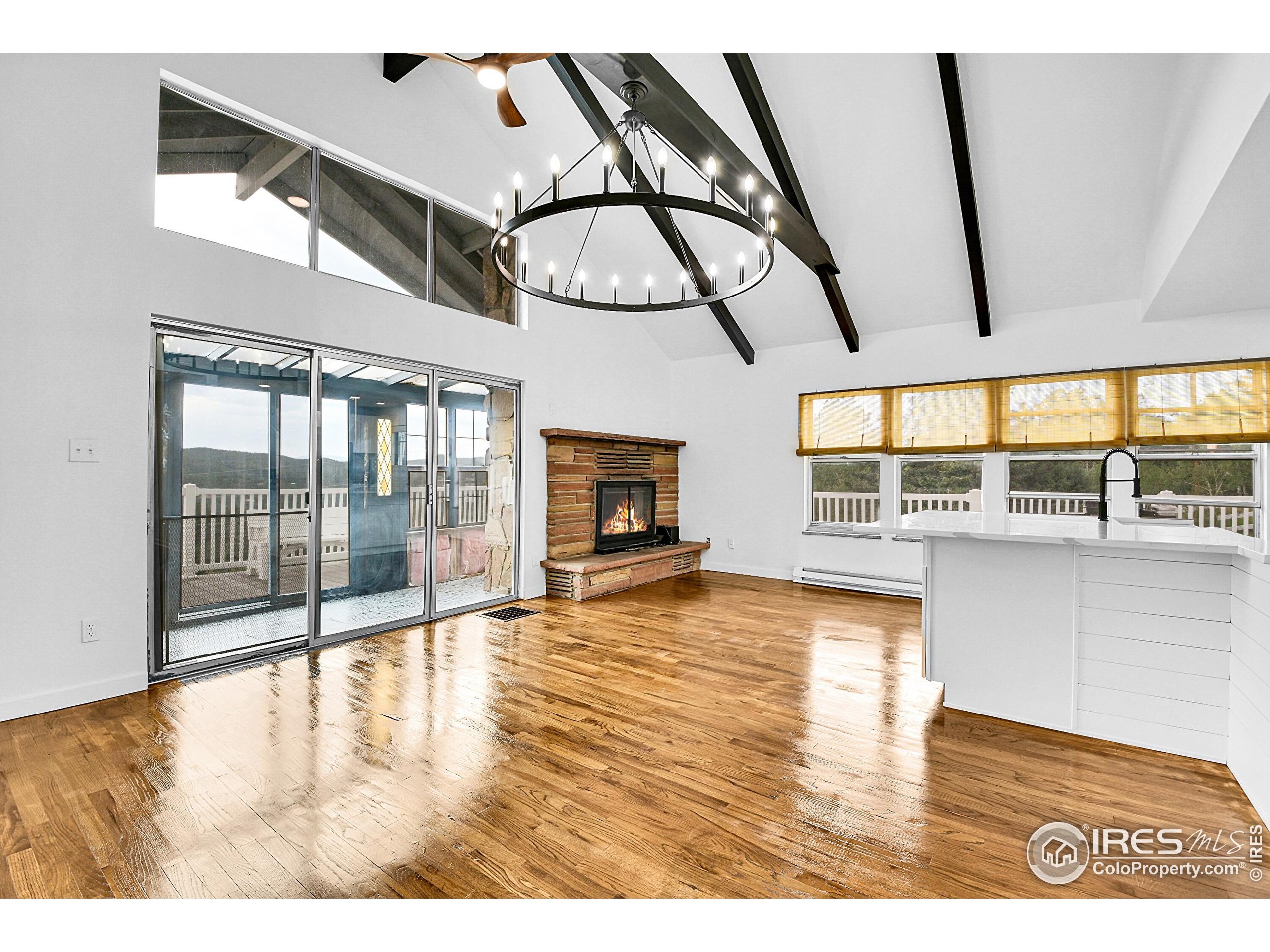 24927 Agate Avenue Conifer, CO 80433 - Photo 22 of 33 a view of an entryway with a floor to ceiling window