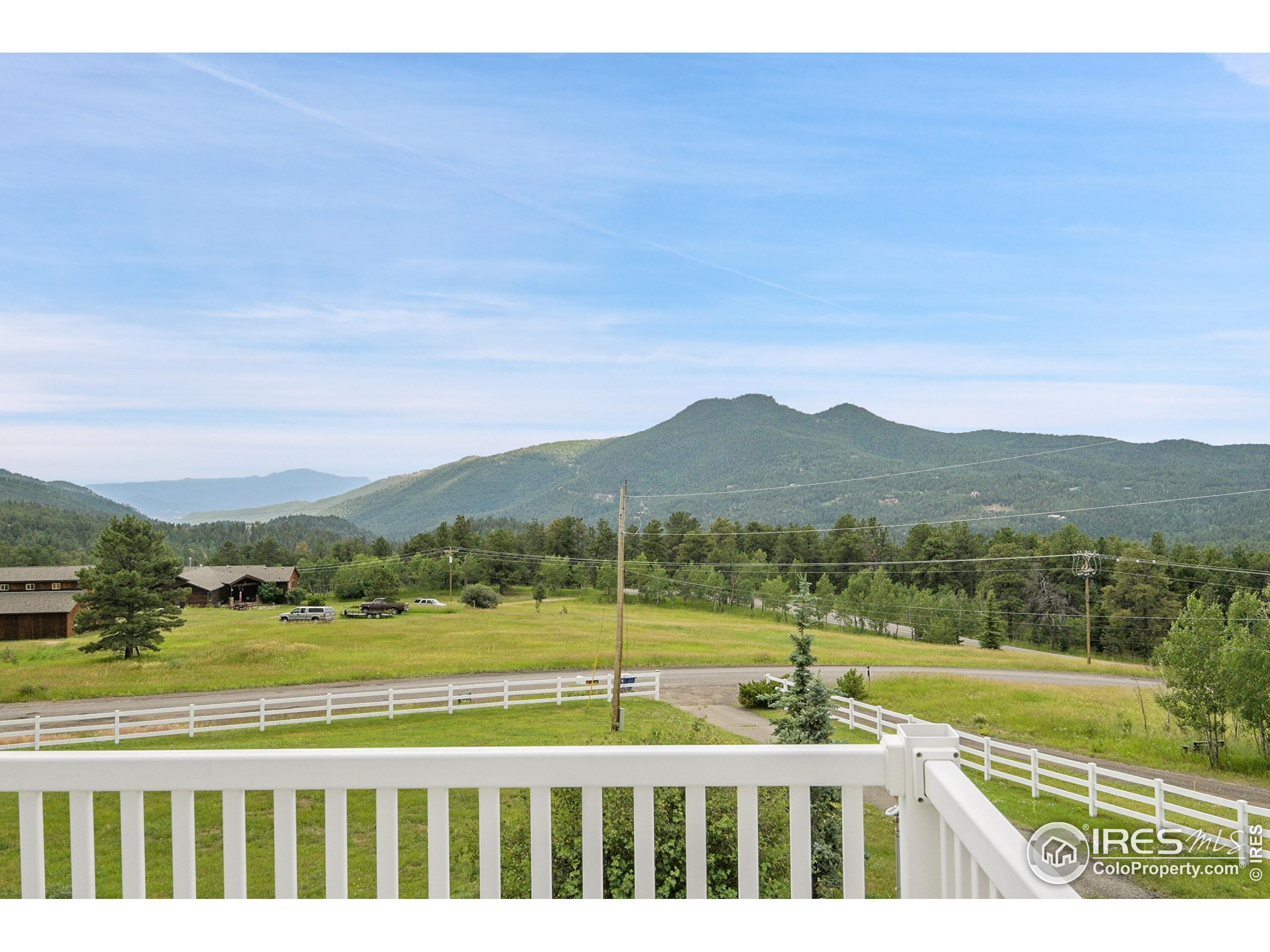 24927 Agate Avenue Conifer, CO 80433 - Photo 5 of 33 a view of lake with mountain