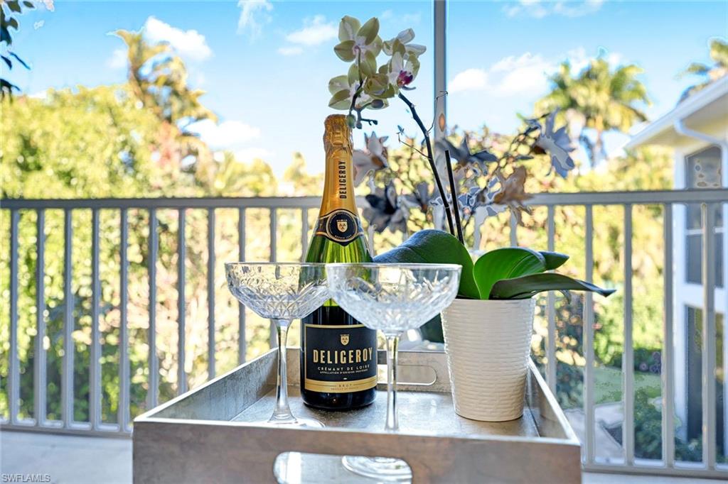 4180 Crayton Road, Unit E8 Naples, FL 34103 - Photo 11 of 20 a view of lot of furniture and window