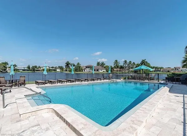 a view of a swimming pool and outdoor space