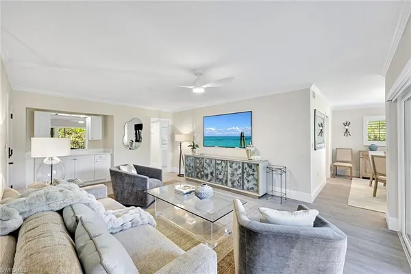 a living room with furniture and a table