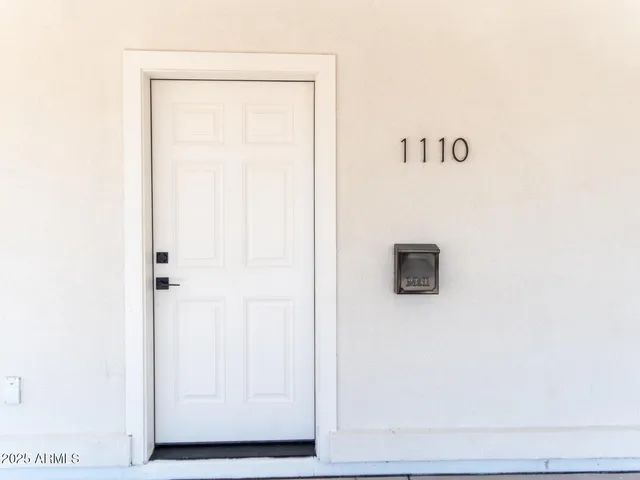 a front view of a house with a garage