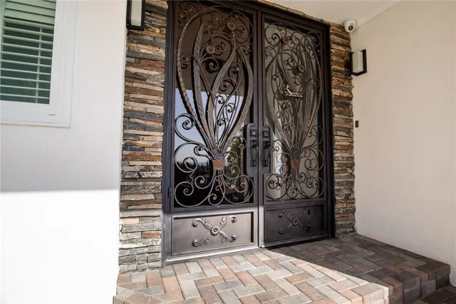 a view of a door and a window