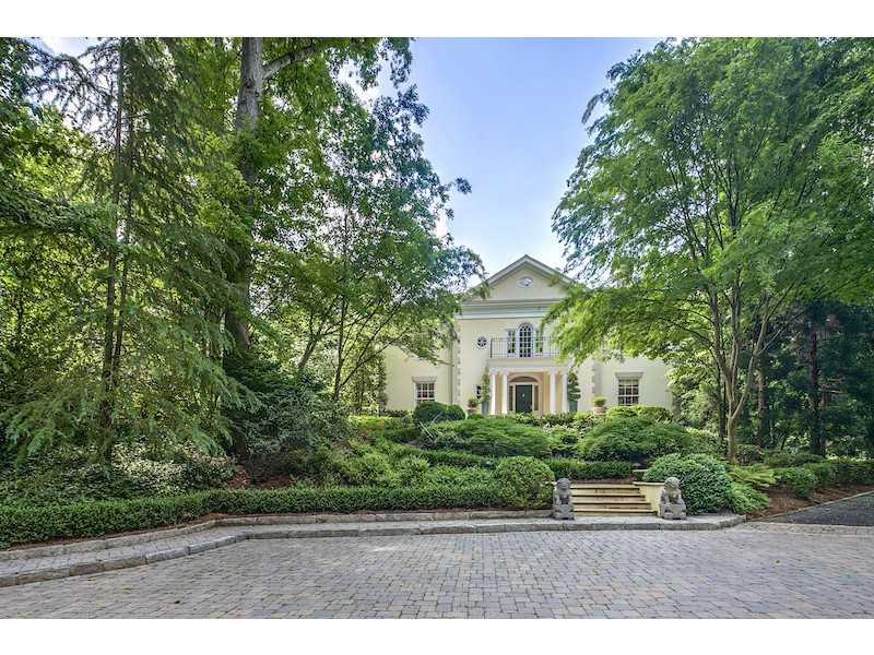 1900 West Paces Ferry Road Northwest Atlanta, GA 30327 - Photo 1 of 1 a view of house with a yard and potted plants