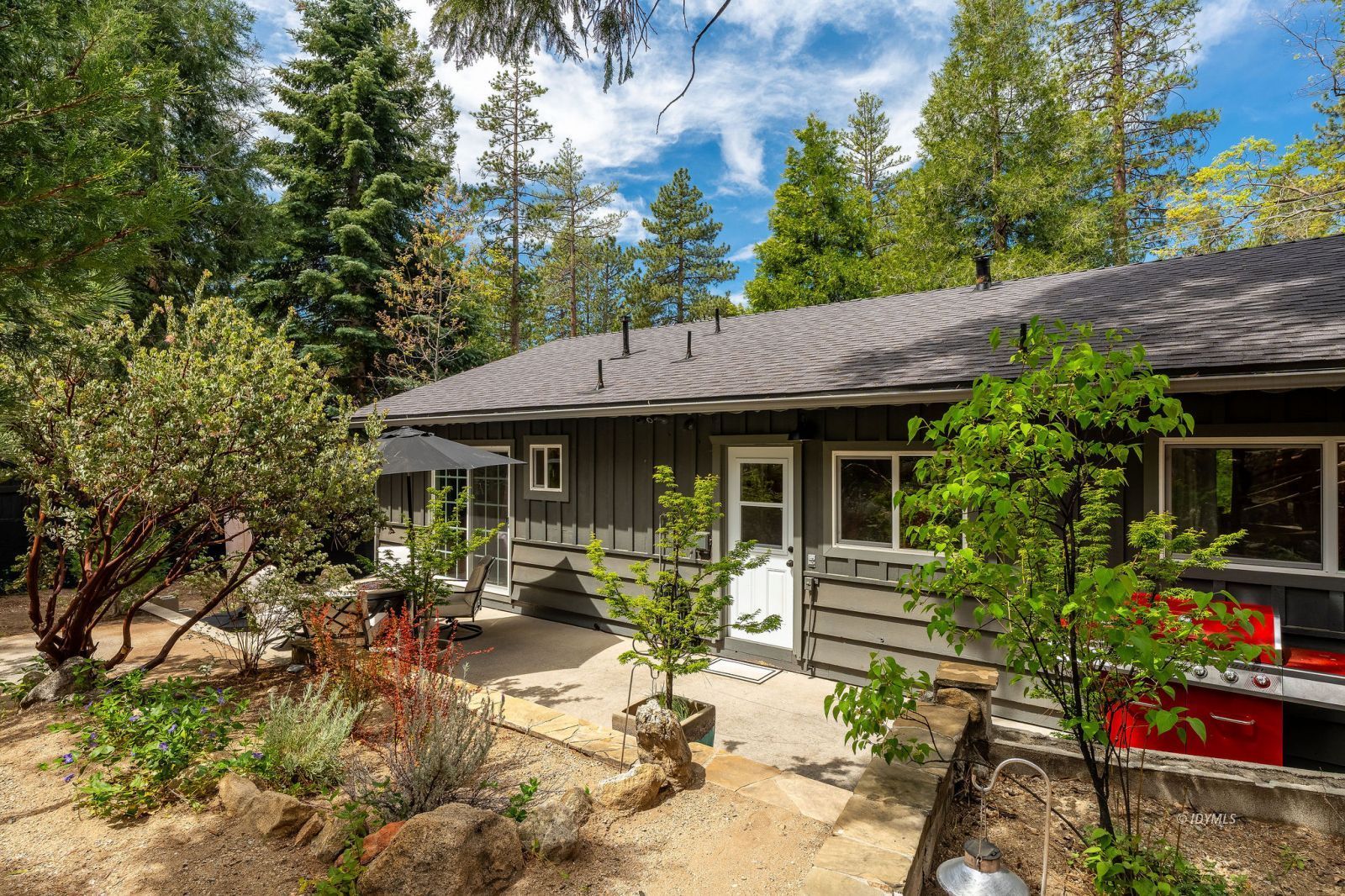 25106 Rim Rock Road Idyllwild, CA 92549 - Photo 68 of 71 a front view of a house with garden