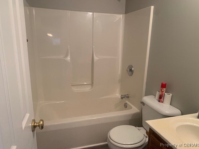 8035 Belroi Road Gloucester, VA 23061 - Photo 9 of 16 Full bathroom with shower / bath combination, vanity, and toilet