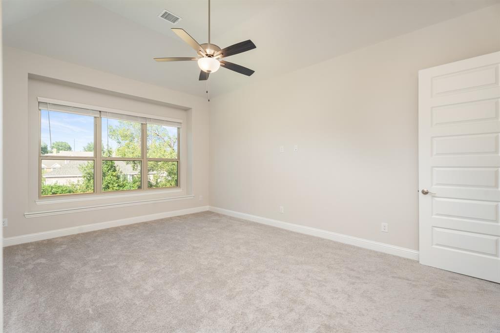 2510 Rockbrook Road Garland, TX 75041 - Photo 20 of 33 an empty room with a window