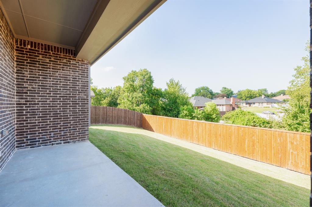 2510 Rockbrook Road Garland, TX 75041 - Photo 27 of 33 a view of backyard with green space