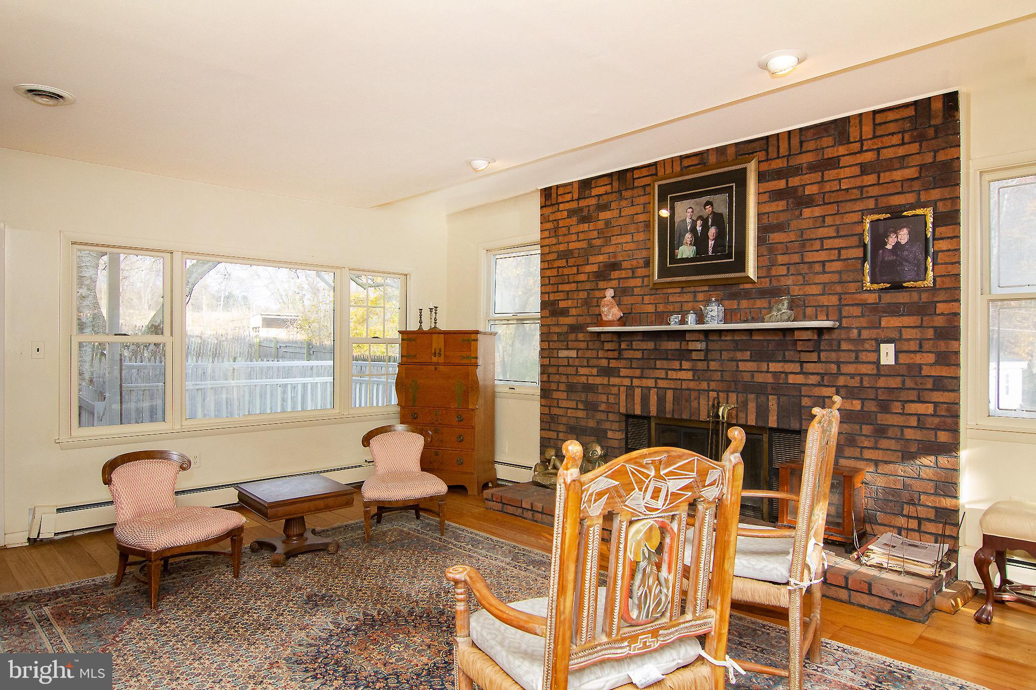 18626 Gunpowder Road Hampstead, MD 21074 - Photo 28 of 66 a living room with furniture and a floor to ceiling window