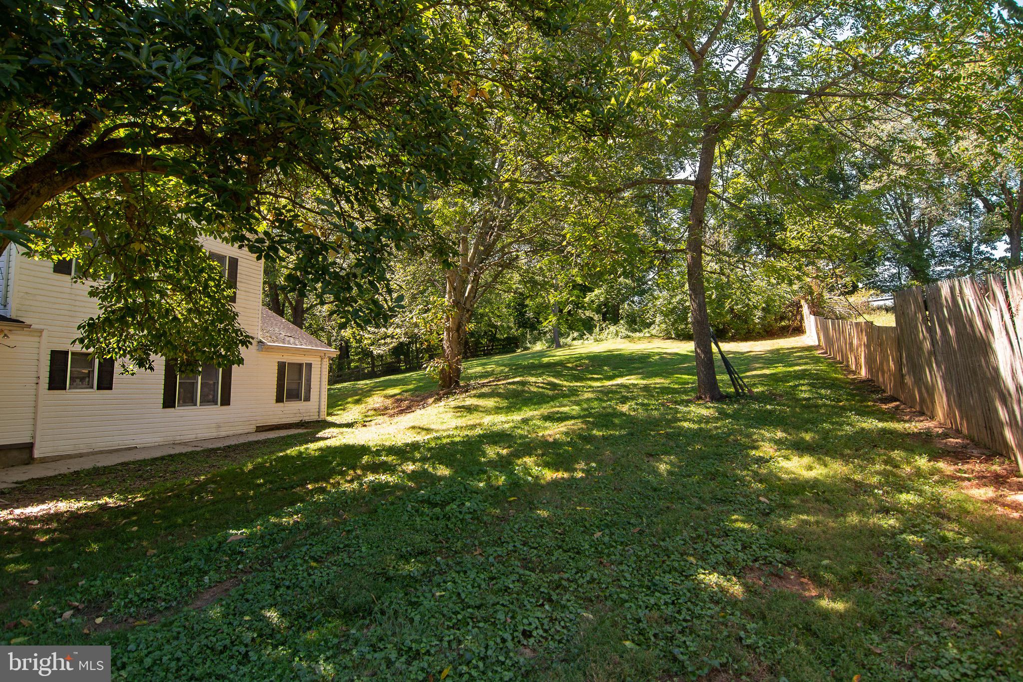 18626 Gunpowder Road Hampstead, MD 21074 - Photo 5 of 66 a backyard of a house with lots of green space