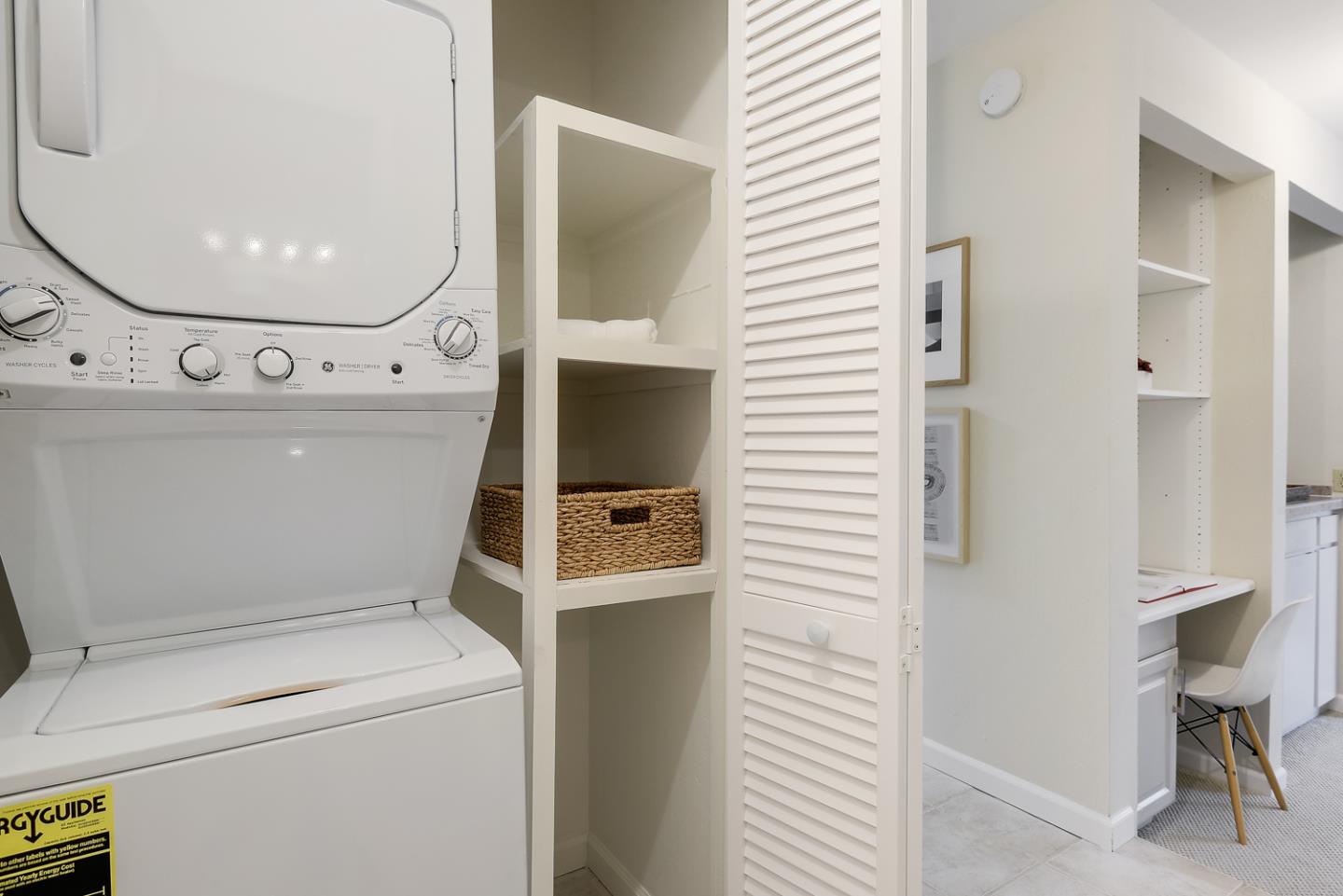 100 East Middlefield Road, Unit 3G Mountain View, CA 94043 - Photo 13 of 22 a view of washer and dryer with bathroom in the background