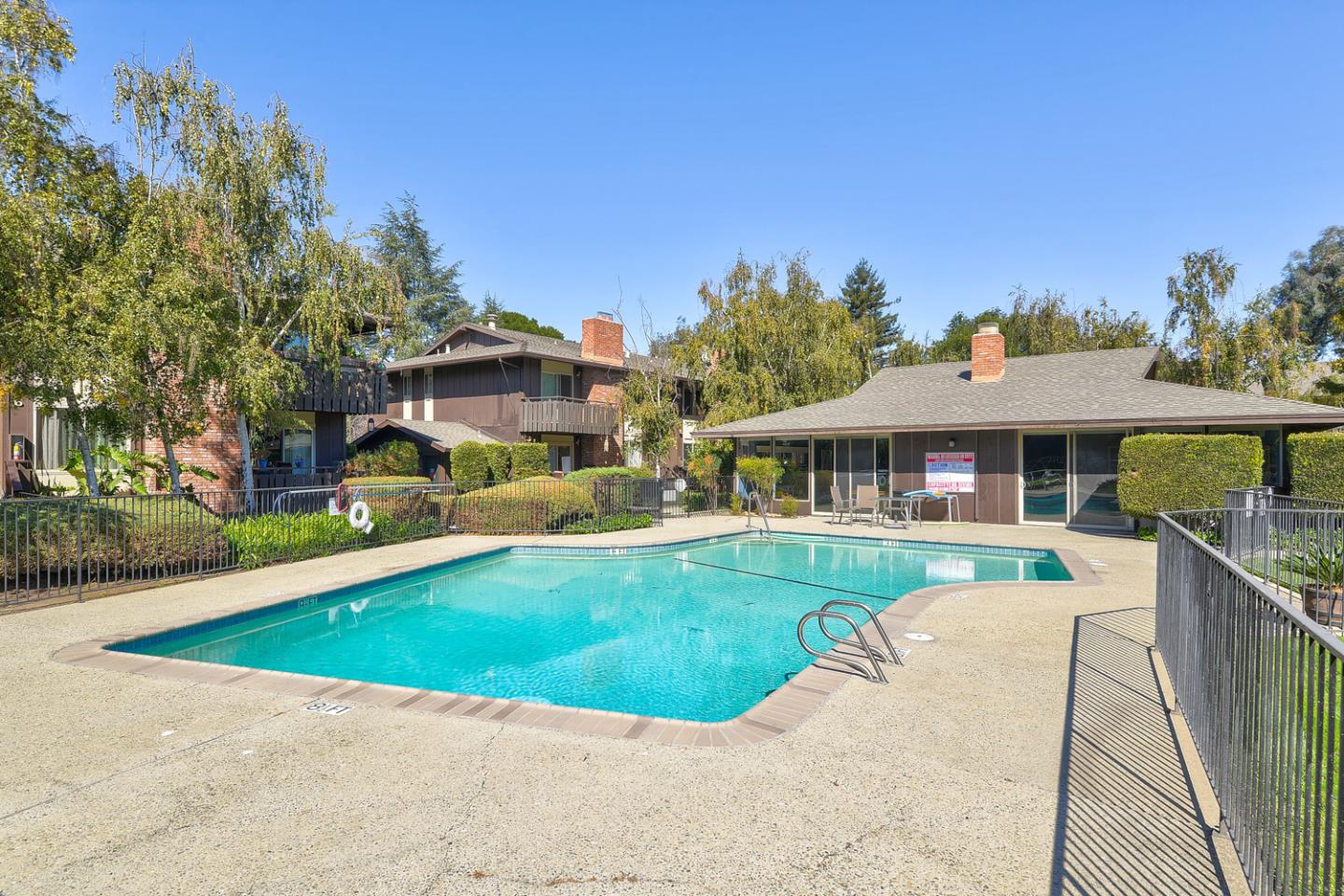 100 East Middlefield Road, Unit 3G Mountain View, CA 94043 - Photo 17 of 22 a front view of house with yard and green space