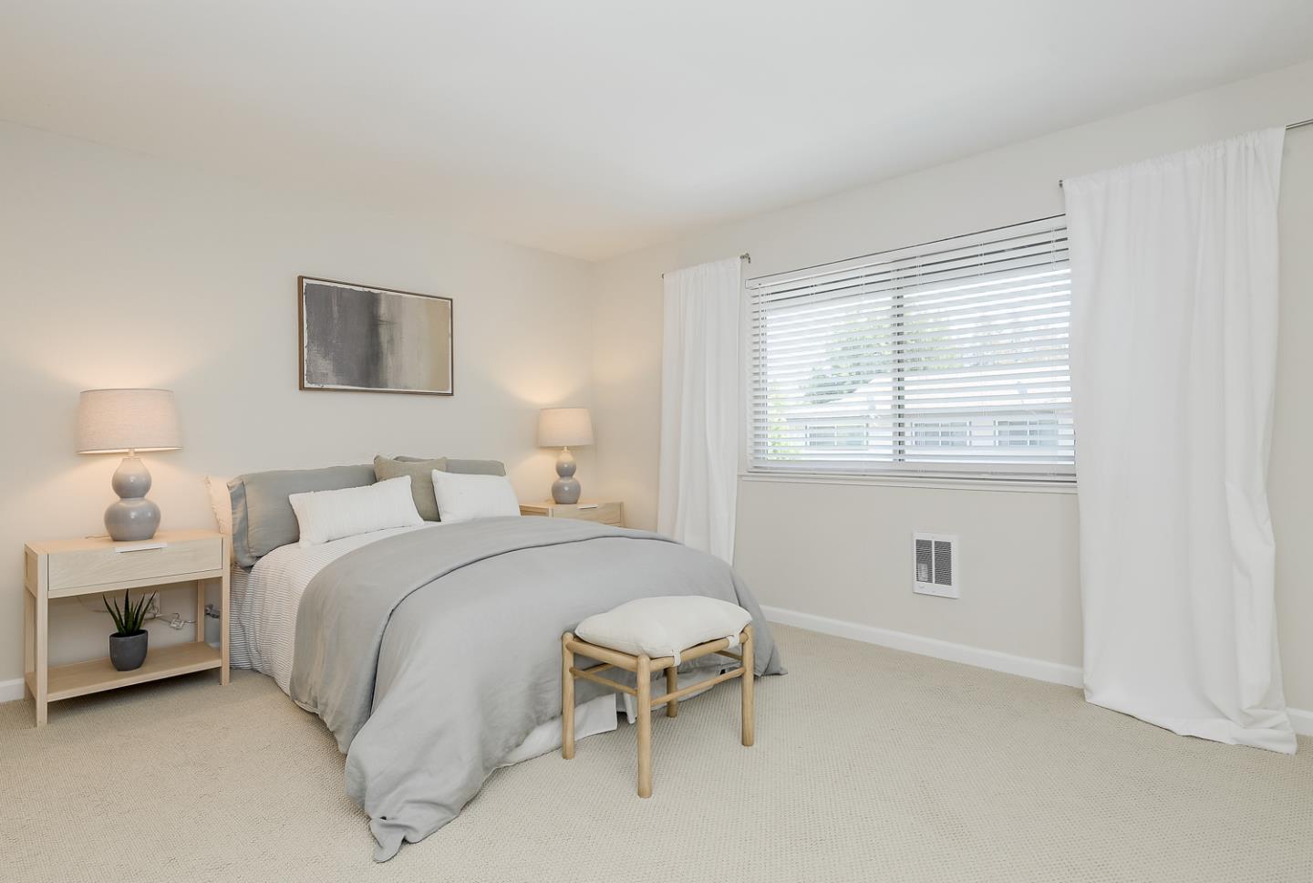 100 East Middlefield Road, Unit 3G Mountain View, CA 94043 - Photo 8 of 22 a bedroom with a bed and a chair