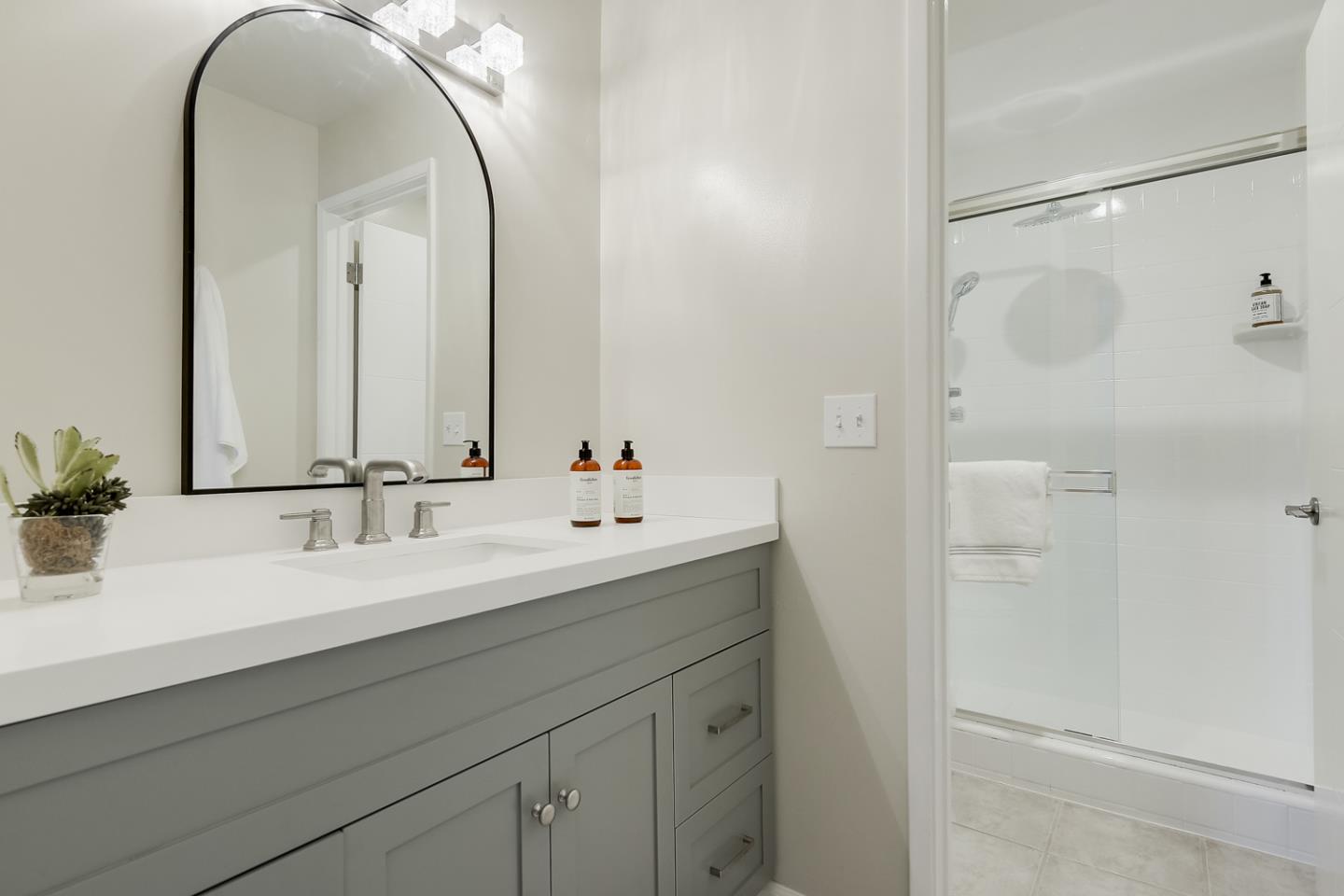 100 East Middlefield Road, Unit 3G Mountain View, CA 94043 - Photo 9 of 22 a bathroom with a double vanity sink and a mirror