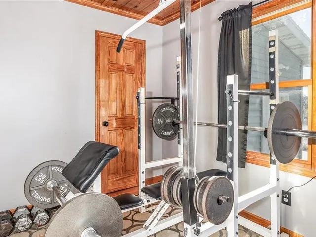 a view of a livingroom with furniture and windows