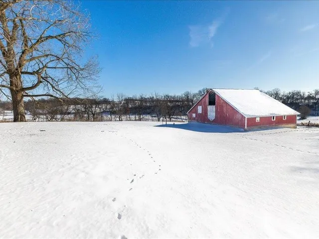 a view of swimming pool with a yard
