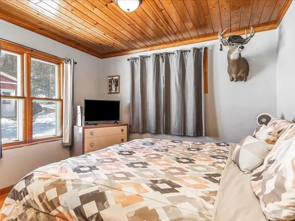 a kitchen with stainless steel appliances granite countertop a refrigerator a sink a stove and island