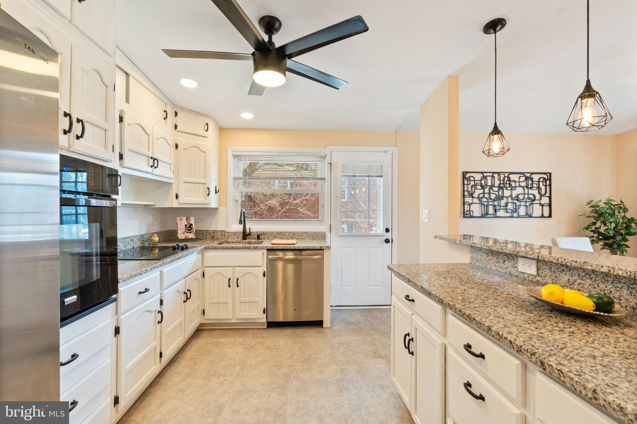 1306 Brixton Road Baltimore, MD 21239 - Photo 13 of 50 Bright and airy kitchen with modern finishes.