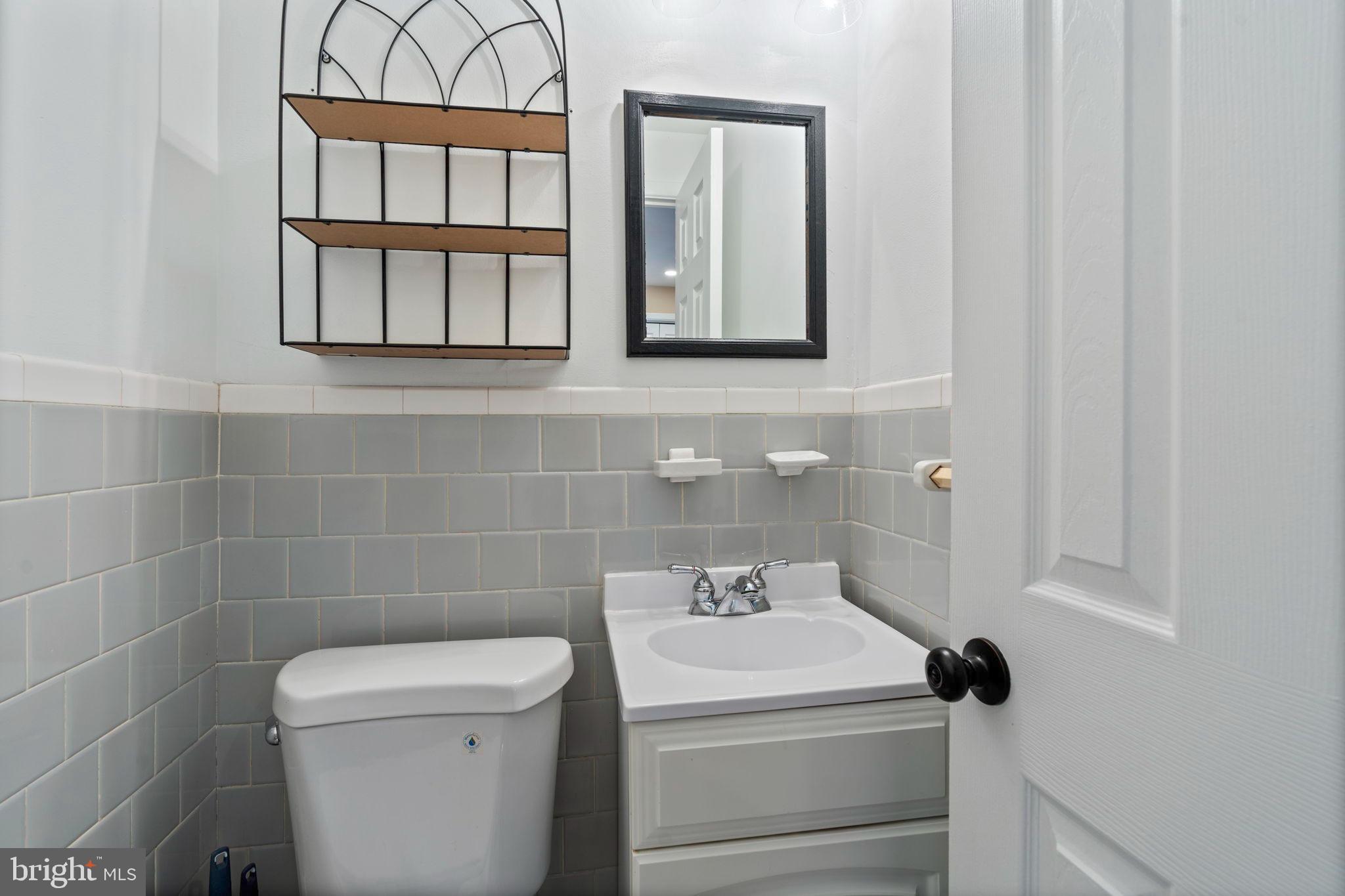 1306 Brixton Road Baltimore, MD 21239 - Photo 20 of 50 Chic and modern half-bath retreat.