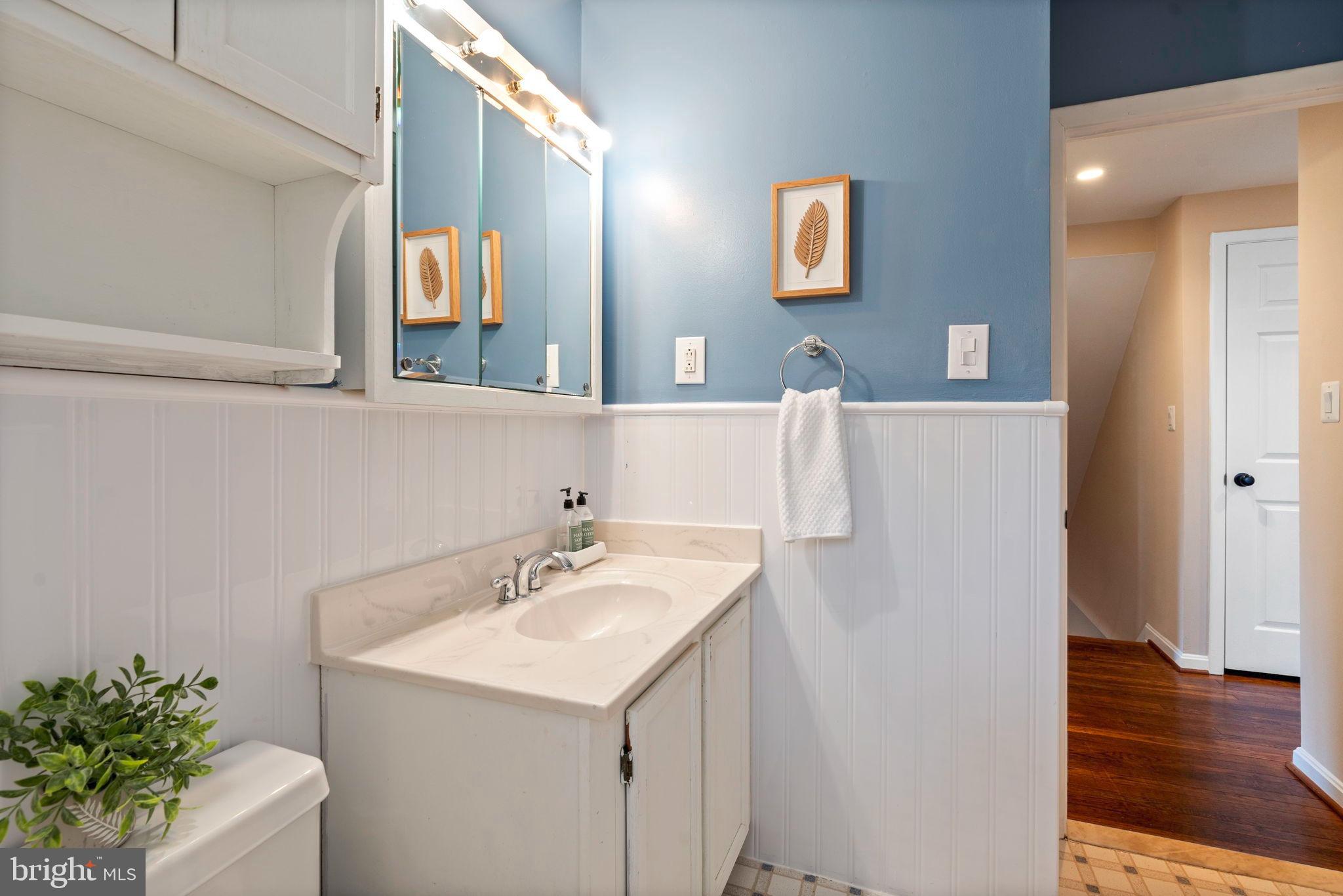 1306 Brixton Road Baltimore, MD 21239 - Photo 26 of 50 Charming bathroom with coastal accents.
