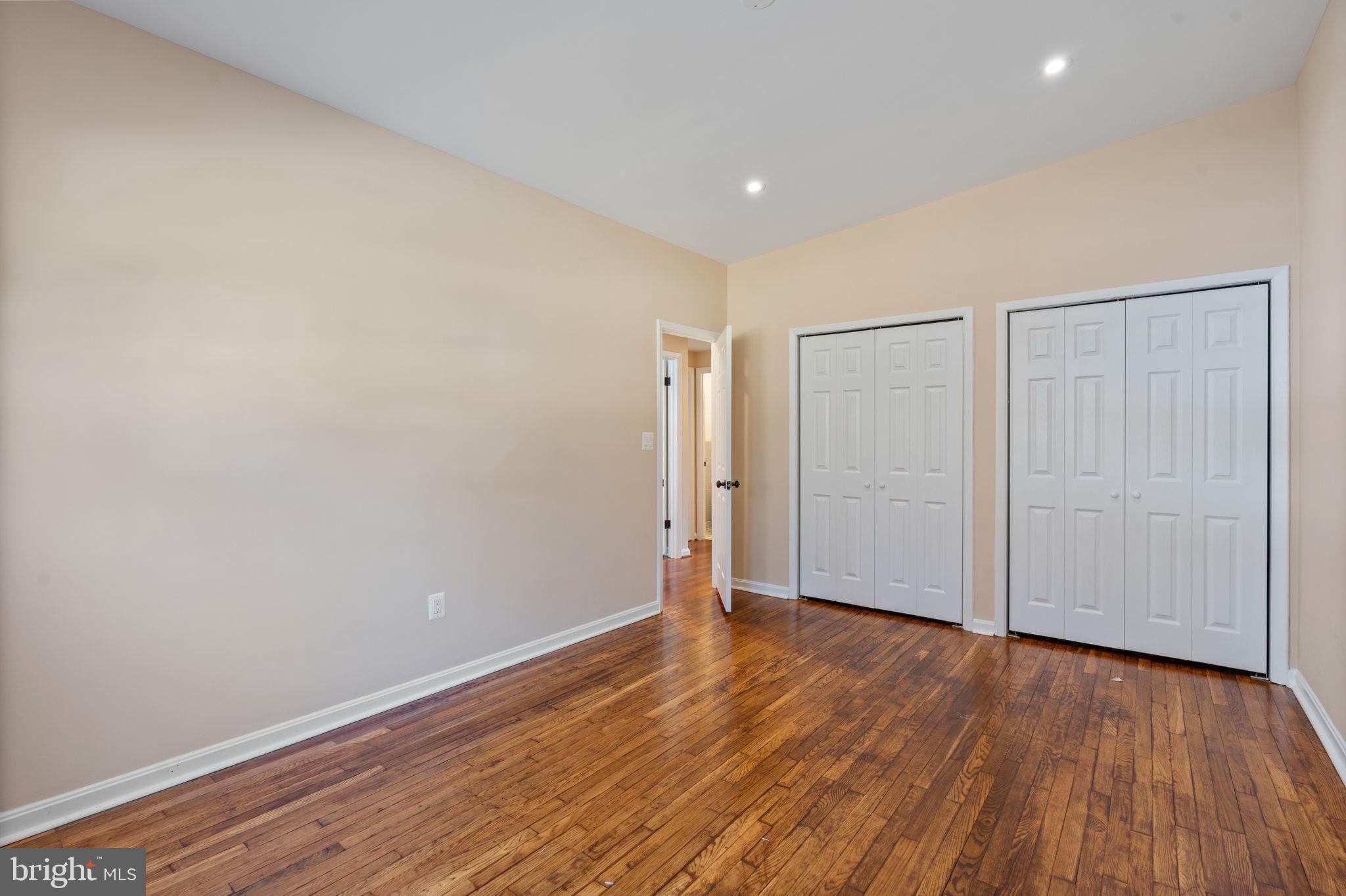 1306 Brixton Road Baltimore, MD 21239 - Photo 28 of 50 Spacious room with warm wooden floors.