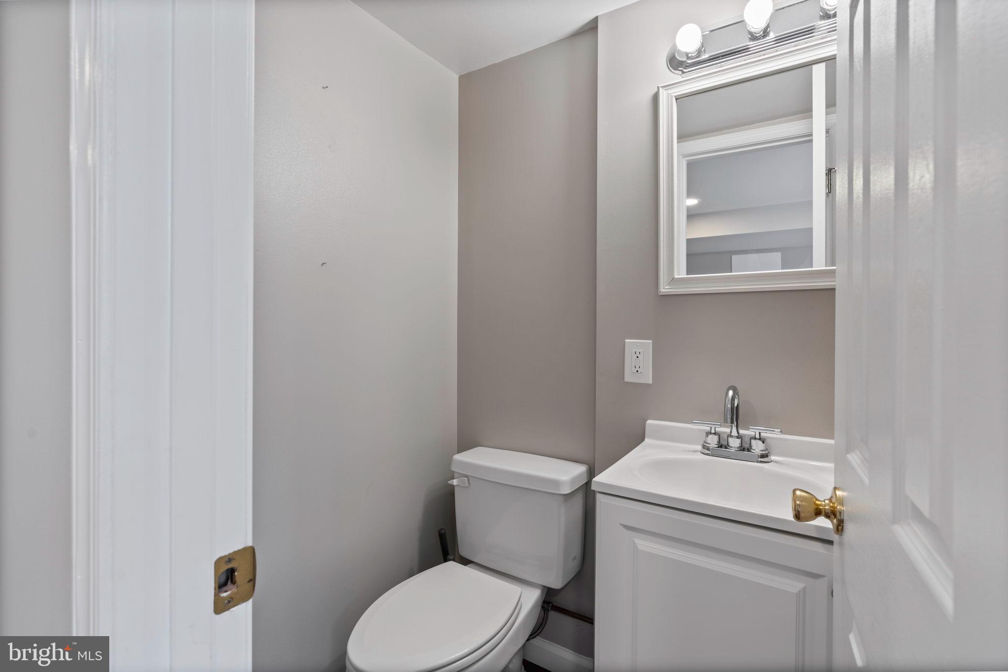 1306 Brixton Road Baltimore, MD 21239 - Photo 34 of 50 Charming half-bath with modern finishes.