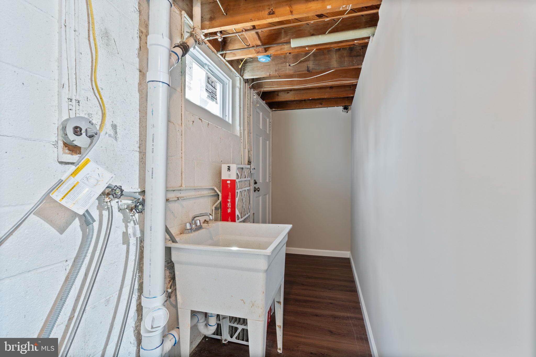 1306 Brixton Road Baltimore, MD 21239 - Photo 36 of 50 Bright and functional utility space.
