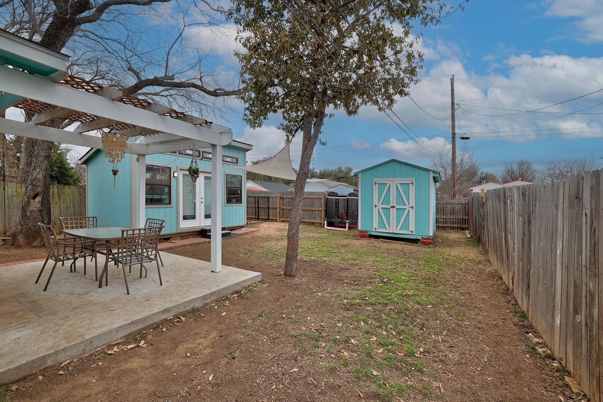 1730 Candee Street Georgetown, TX 78626 - Photo 23 of 26 a view of a house with backyard and a tree