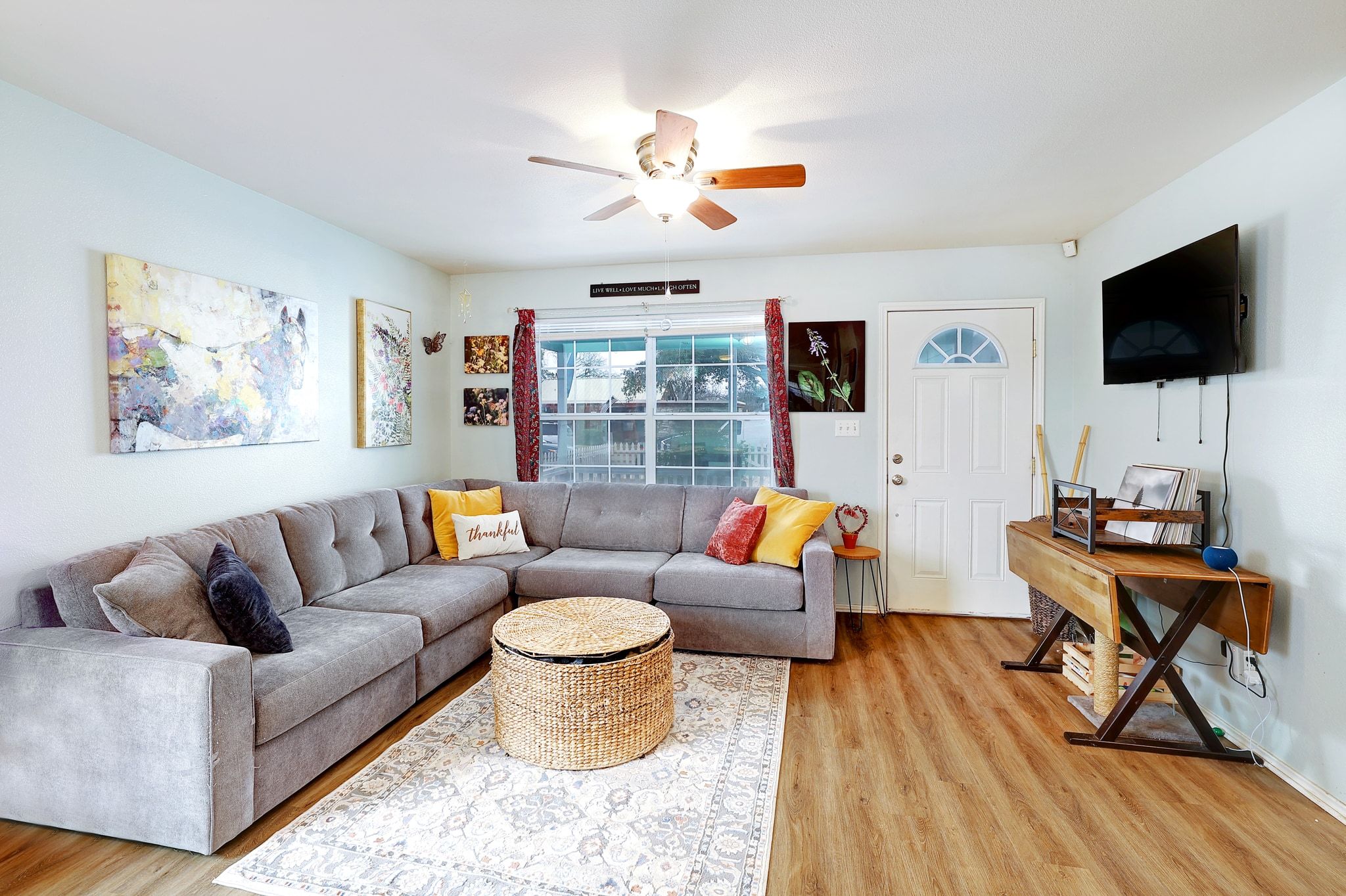1730 Candee Street Georgetown, TX 78626 - Photo 3 of 26 a living room with furniture and a flat screen tv
