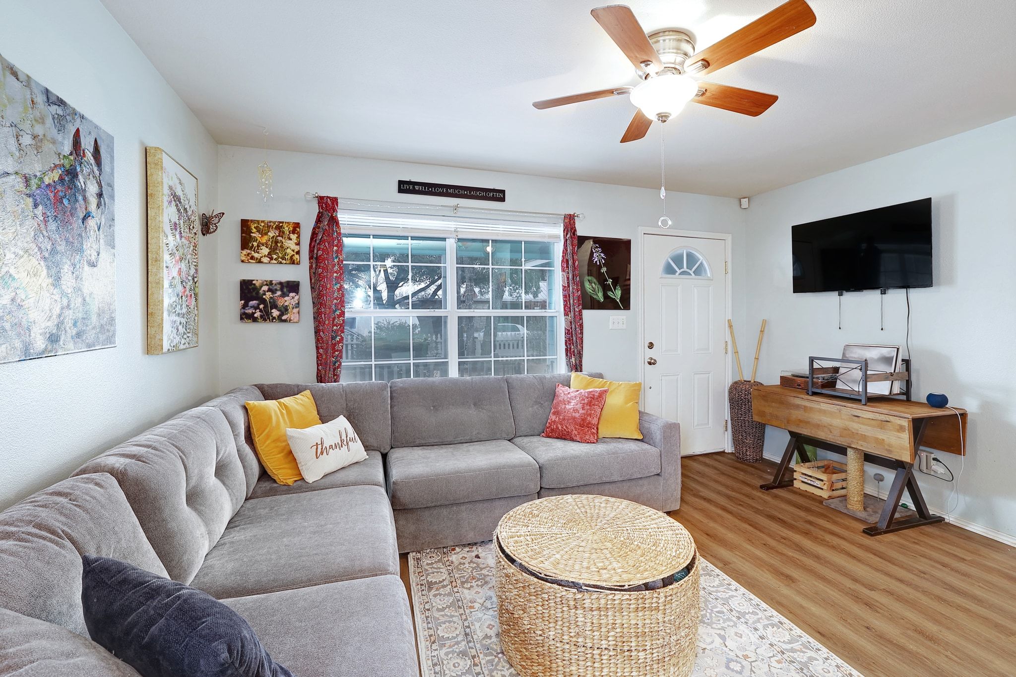 1730 Candee Street Georgetown, TX 78626 - Photo 6 of 26 a living room with furniture and a flat screen tv