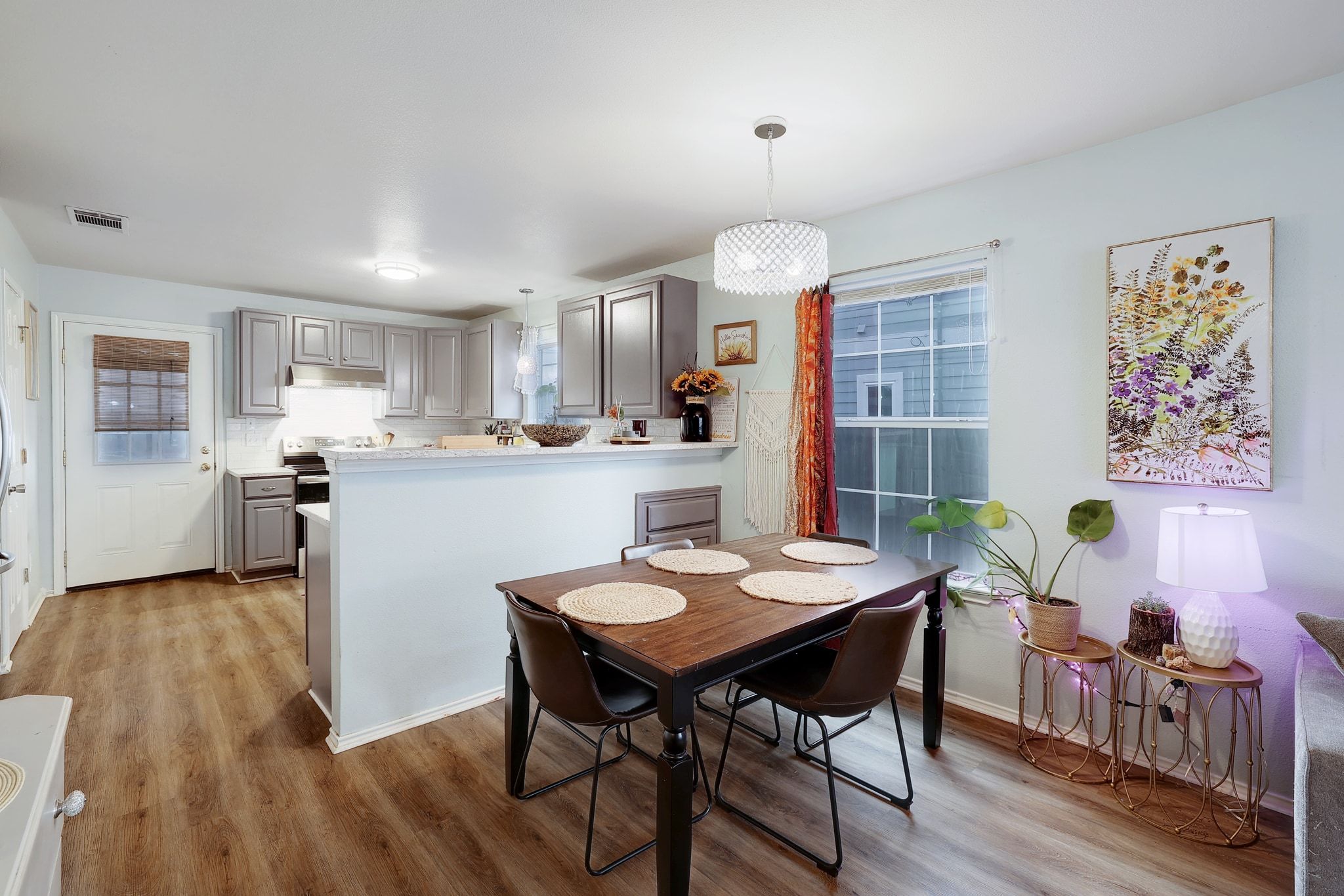 1730 Candee Street Georgetown, TX 78626 - Photo 7 of 26 a view of a dining room with furniture window and wooden floor