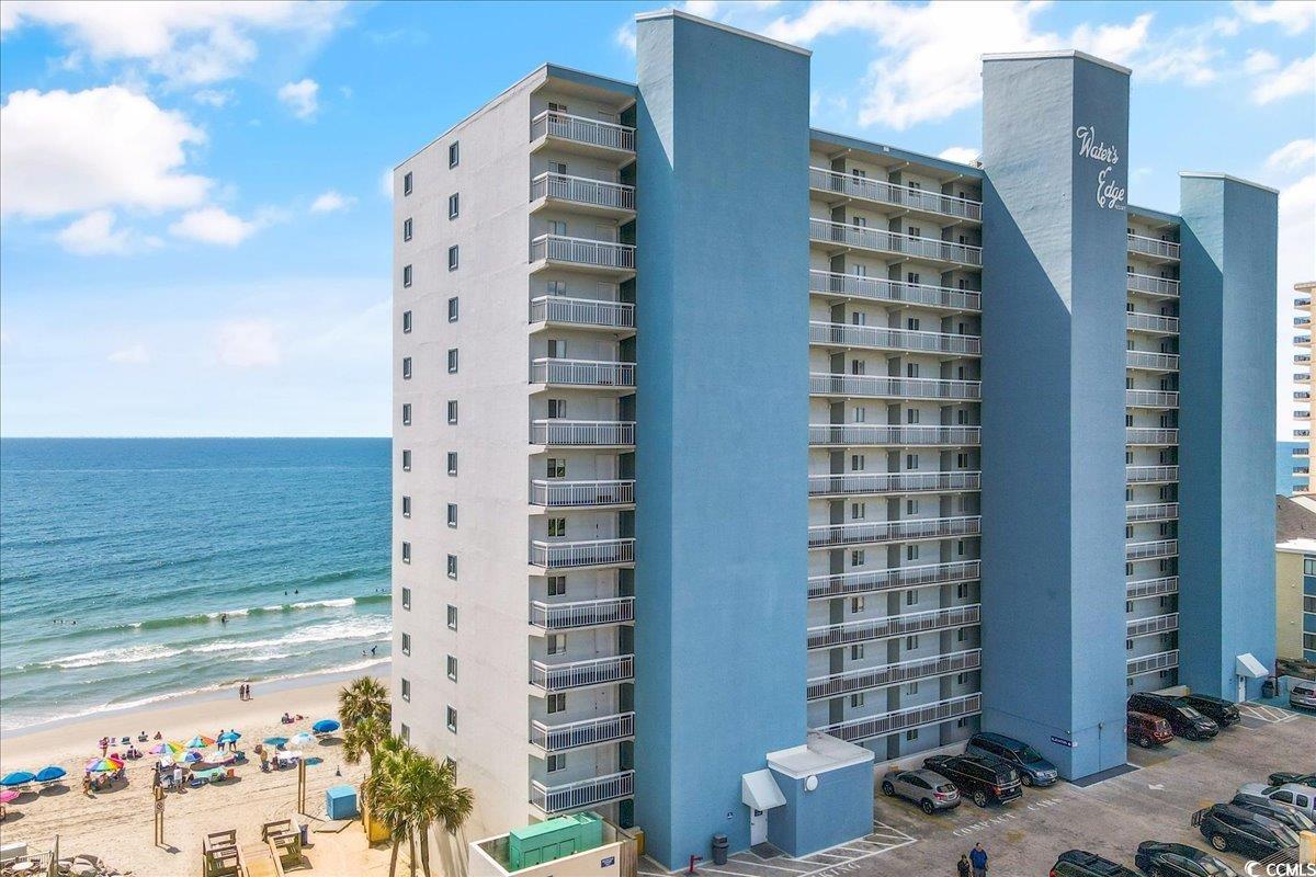 1012 North Waccamaw Drive, Unit 1105 Murrells Inlet, SC 29576 - Photo 1 of 40 View of building exterior featuring a water view a